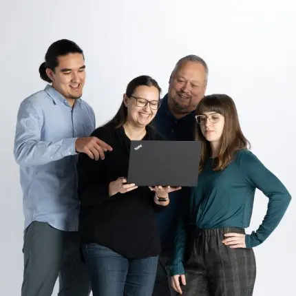 Group looking at computer