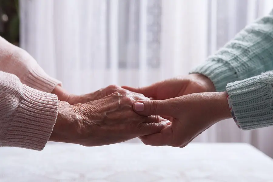 Holding Hands Young and Old