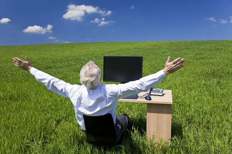 Celebrating at a grassy workstation