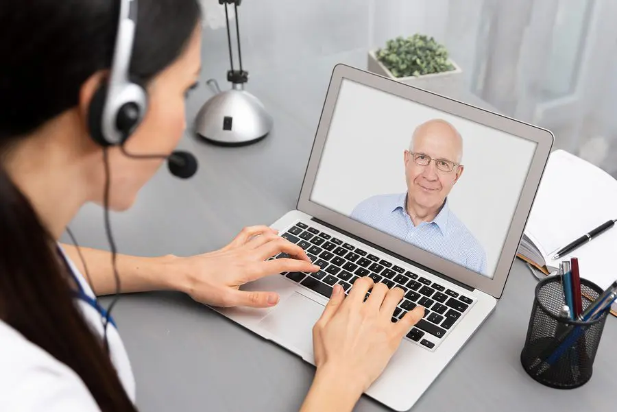 Doctor on phone with Senior