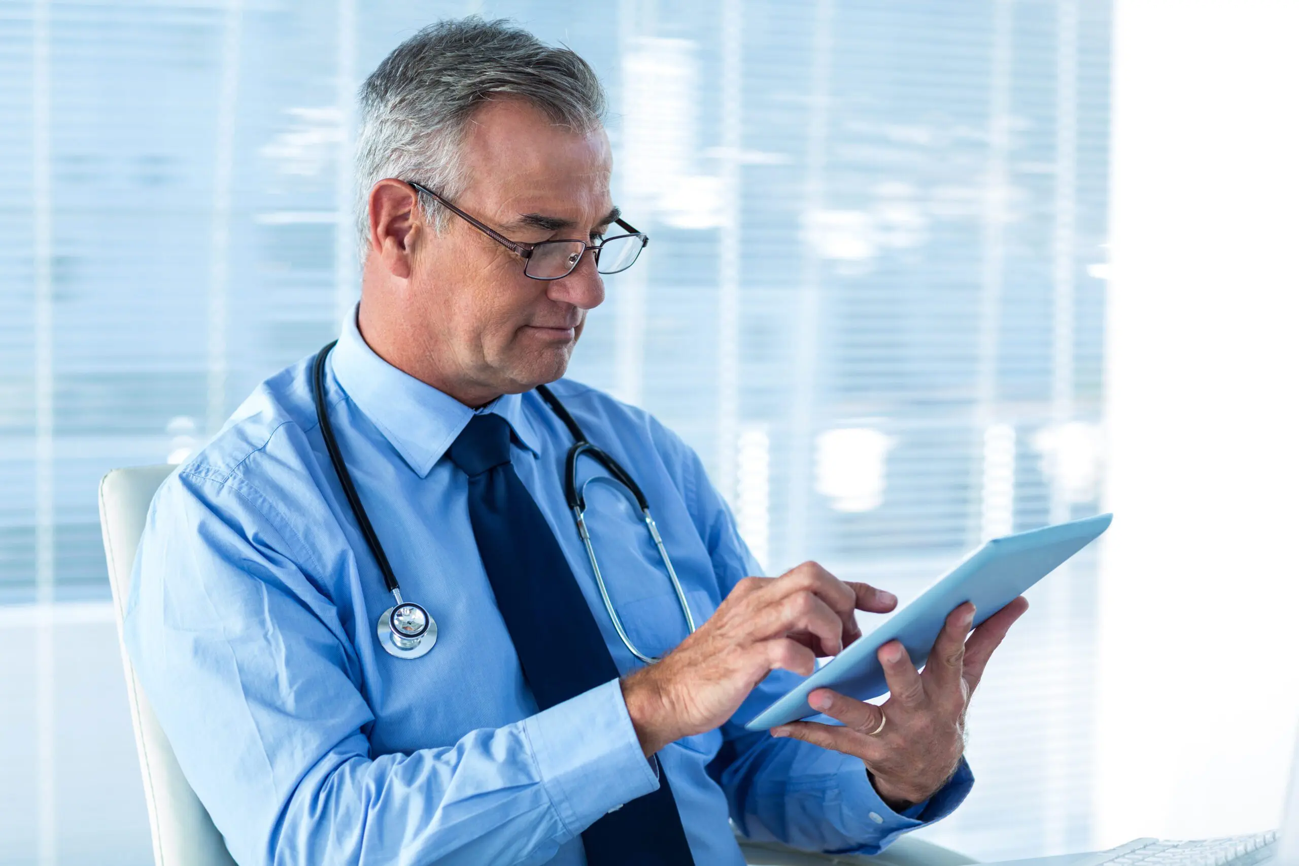 Doctor Holding Ipad