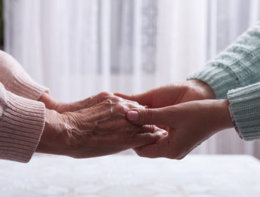 Holding Hands Young and Old