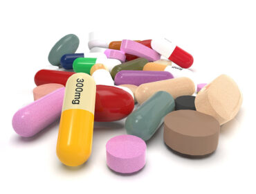 varicolored pills isolated on white background 3d rendering