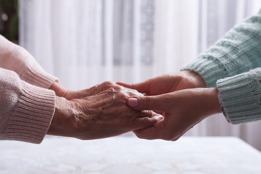 Holding Hands Young and Old